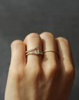 Model wearing the Five Stone Claire Engagement Ring in yellow gold by Fluid Jewellery 2