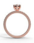 Close up of the Accented Edith Solitaire Engagement Ring in rose gold by Fluid Jewellery 2