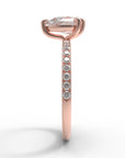 Close up of the Accented Edith Solitaire Engagement Ring in rose gold by Fluid Jewellery 3