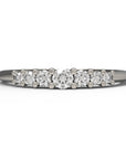 Close up of the seven stone Elsie womens wedding band by Fluid Jewellery in white gold