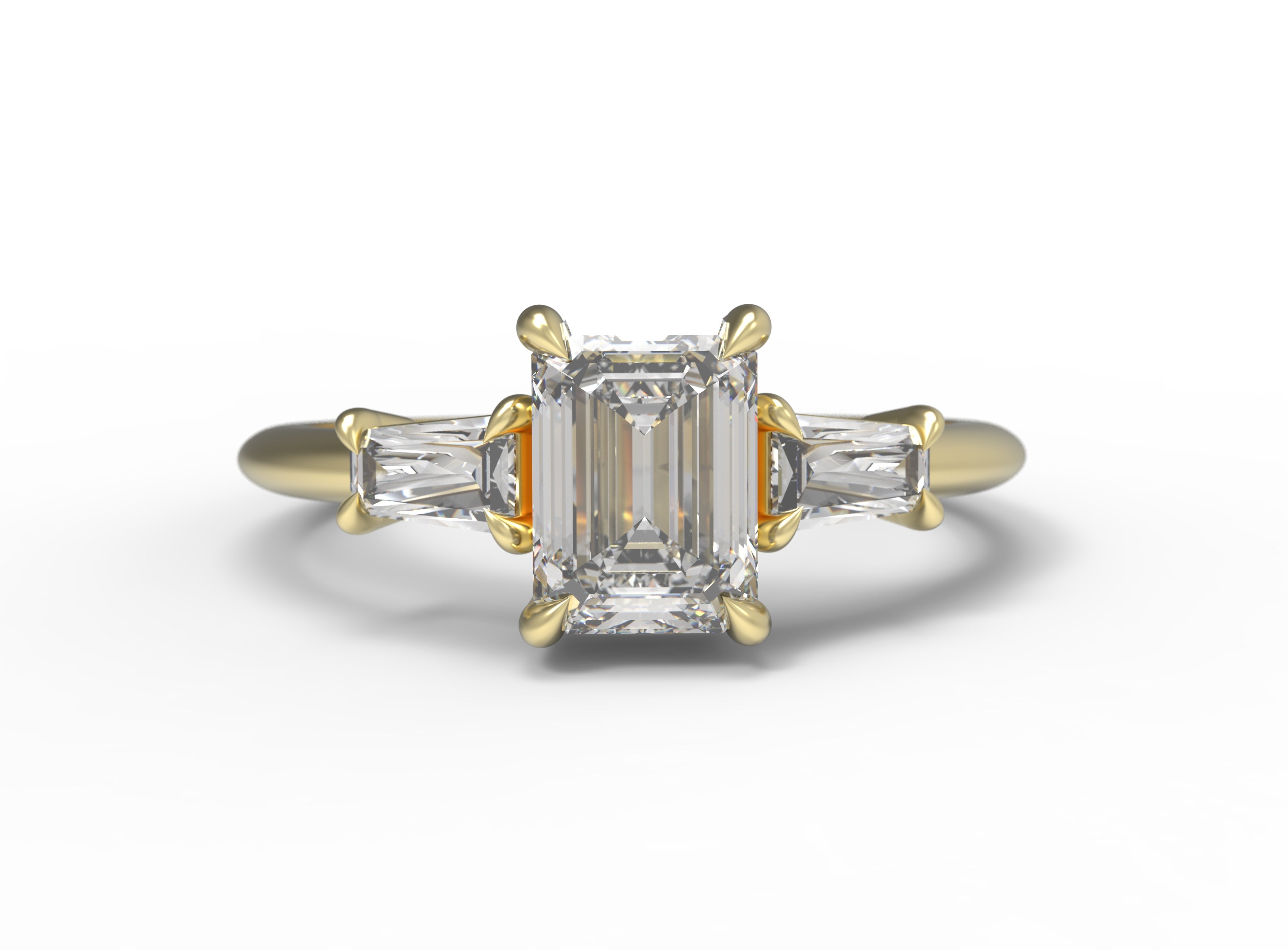 Close up of the Three Stone Adele Solitaire Engagement Ring in yellow gold by Fluid Jewellery