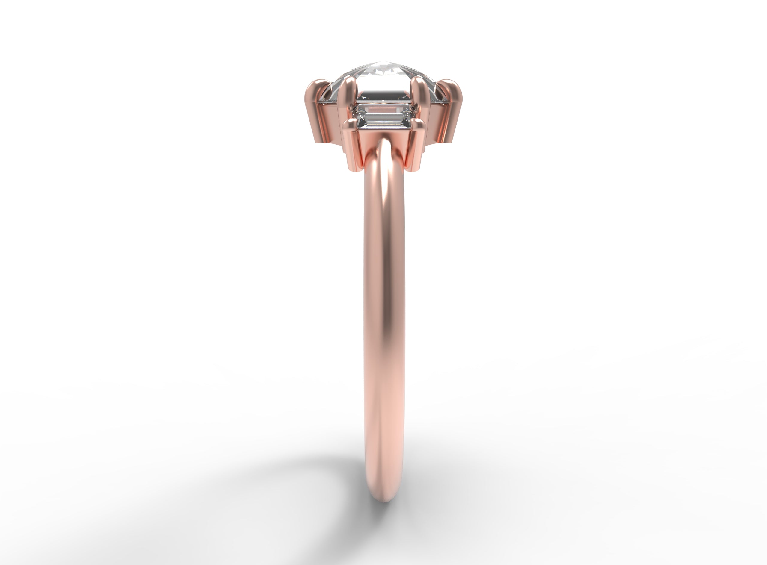 Close up of the Three Stone Alice Solitaire Engagement Ring in rose gold by Fluid Jewellery 2