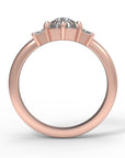 Close up of the Three Stone Alice Solitaire Engagement Ring in rose gold by Fluid Jewellery 3