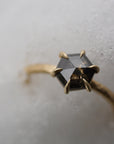 Close up of the Classic Celeste Solitaire Engagement Ring in yellow gold by Fluid Jewellery