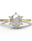 Close up of the Classic Celeste Solitaire Engagement Ring in yellow gold by Fluid Jewellery
