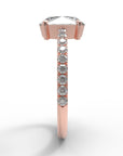 Close up of the Chloe Solitaire Engagement Ring in rose gold by Fluid Jewellery