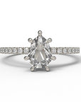 Close up of the Accented Daphne Solitaire Engagement Ring in white gold by Fluid Jewellery