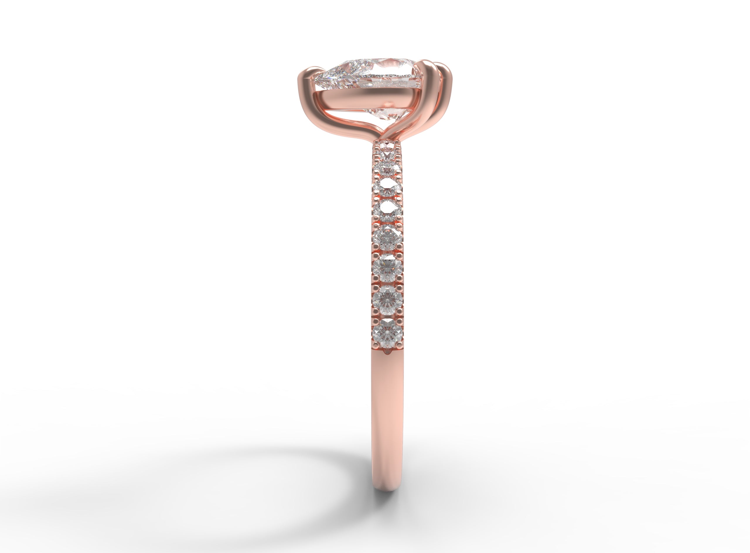 Close up of the Accented Edith Solitaire Engagement Ring in rose gold by Fluid Jewellery  3