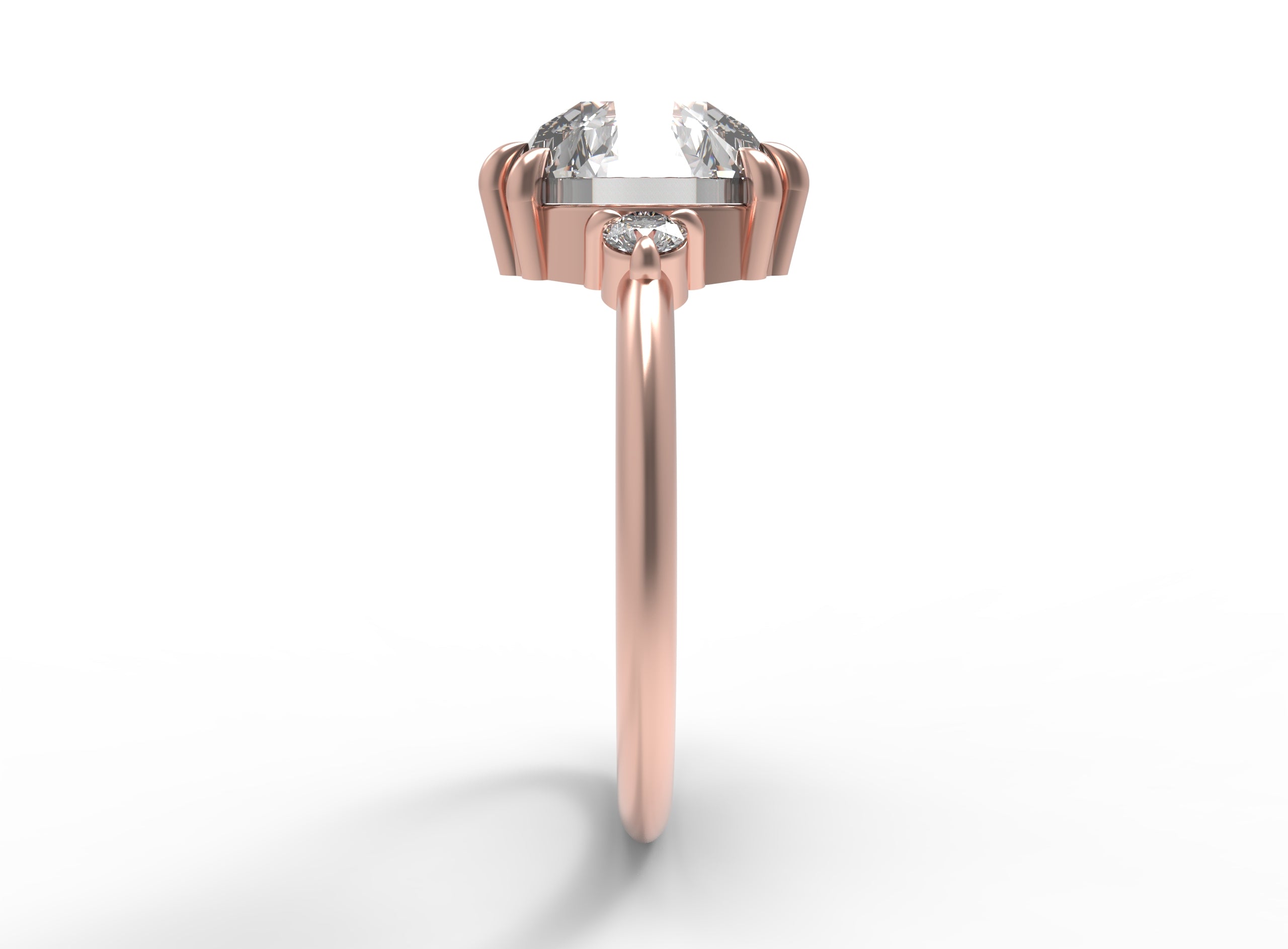 Close up of the Three Stone Elizabeth Engagement Ring in rose gold by Fluid Jewellery 2