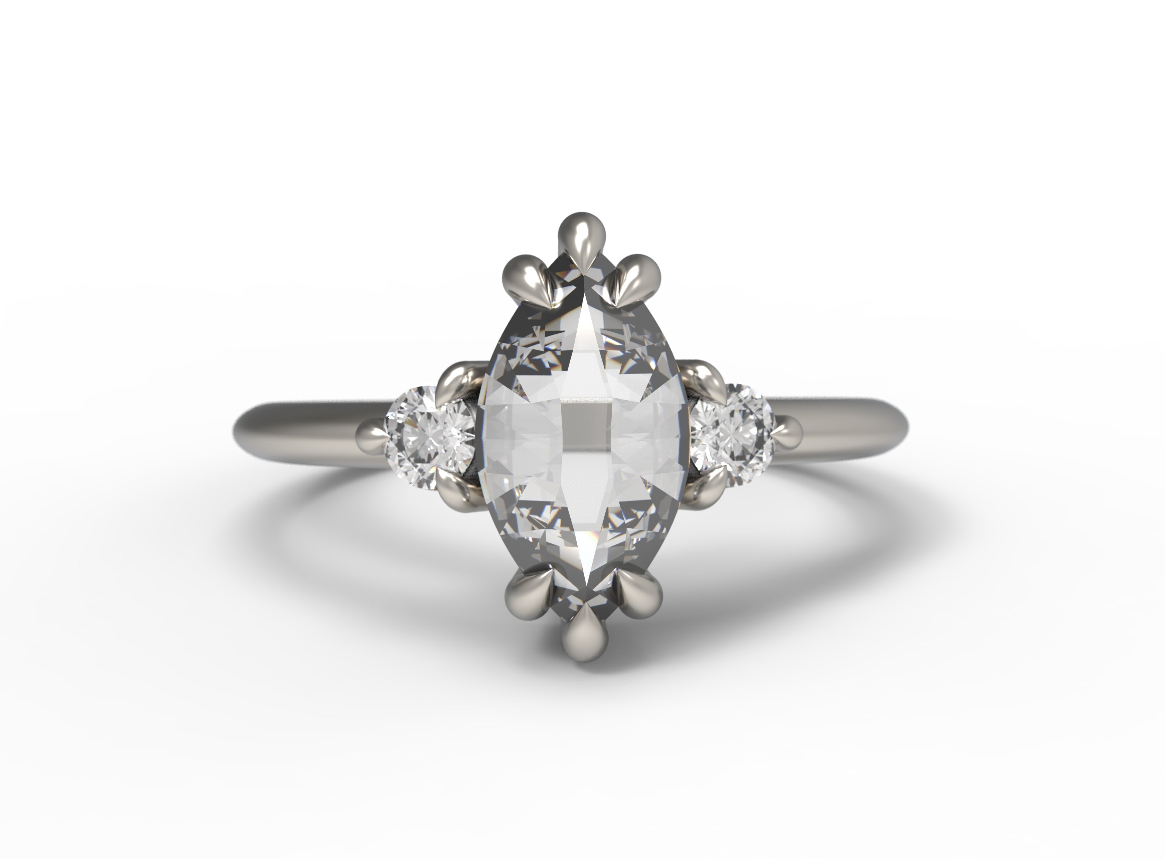 Close up of the Three Stone Elizabeth Engagement Ring in white gold by Fluid Jewellery