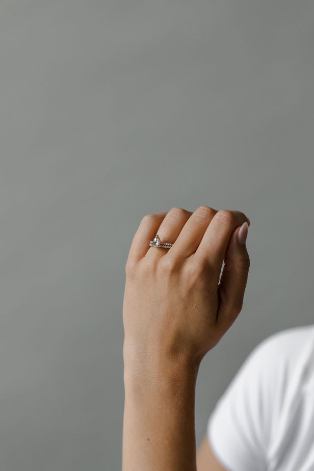 Model wearing the Classic Ivy Engagement Ring in gold by Fluid Jewellery 3