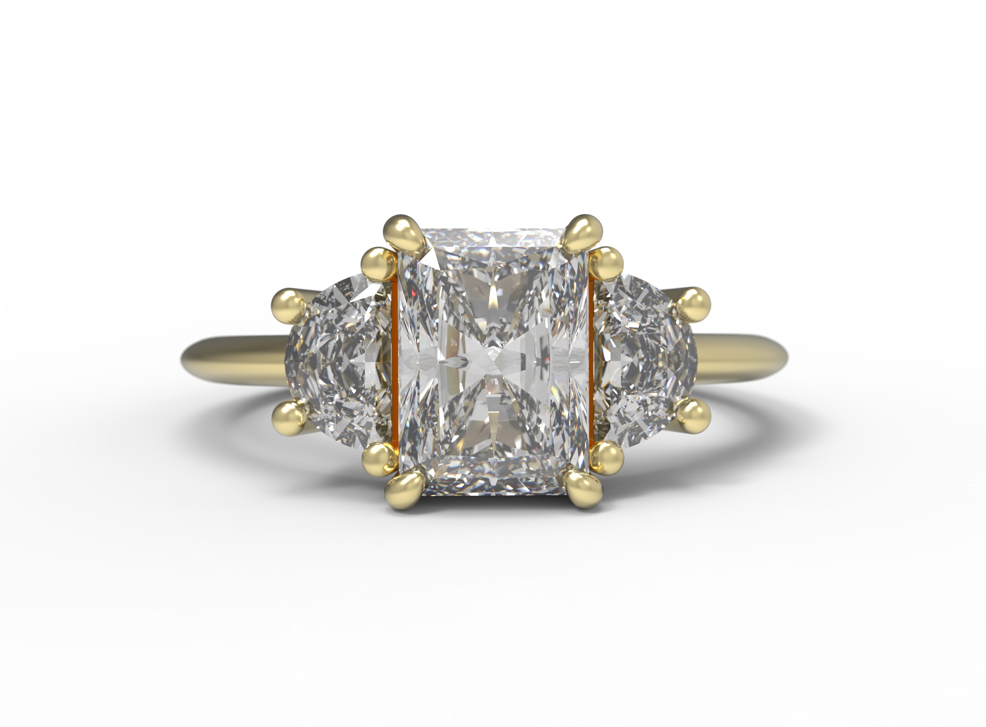 Close up of the Three Stone Merike Engagement Ring in yellow gold by Fluid Jewellery