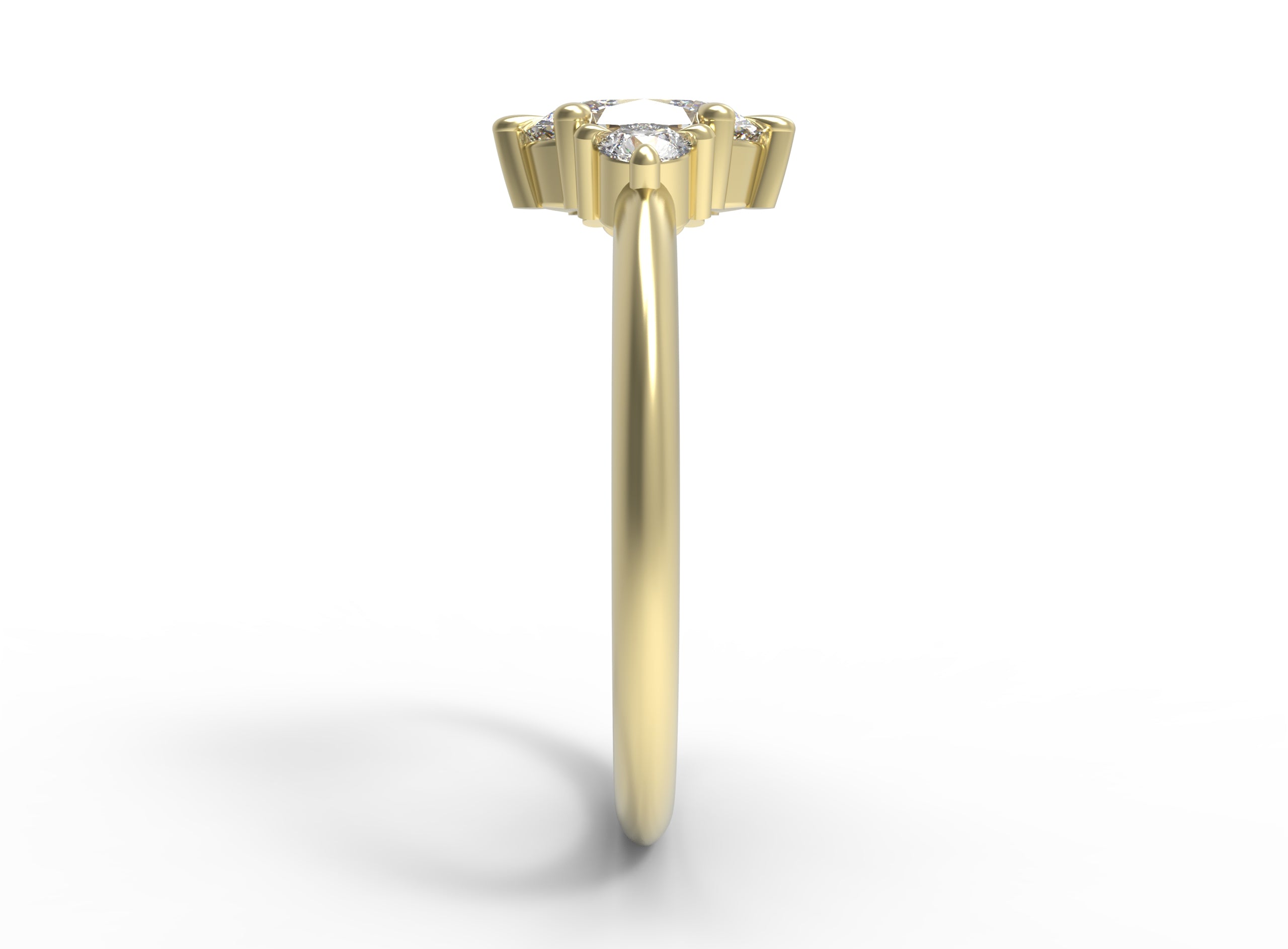 Close up of the Three Stone Rebecca Solitaire Engagement Ring in yellow gold by Fluid Jewellery2