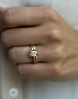Model wearing the  Classic Talon Solitaire Engagement Ring in gold