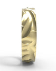 Close up of the mens Wave wedding band in yellow gold 2