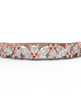 Close up of the cluster Marissa womens wedding band by Fluid Jewellery in rose gold