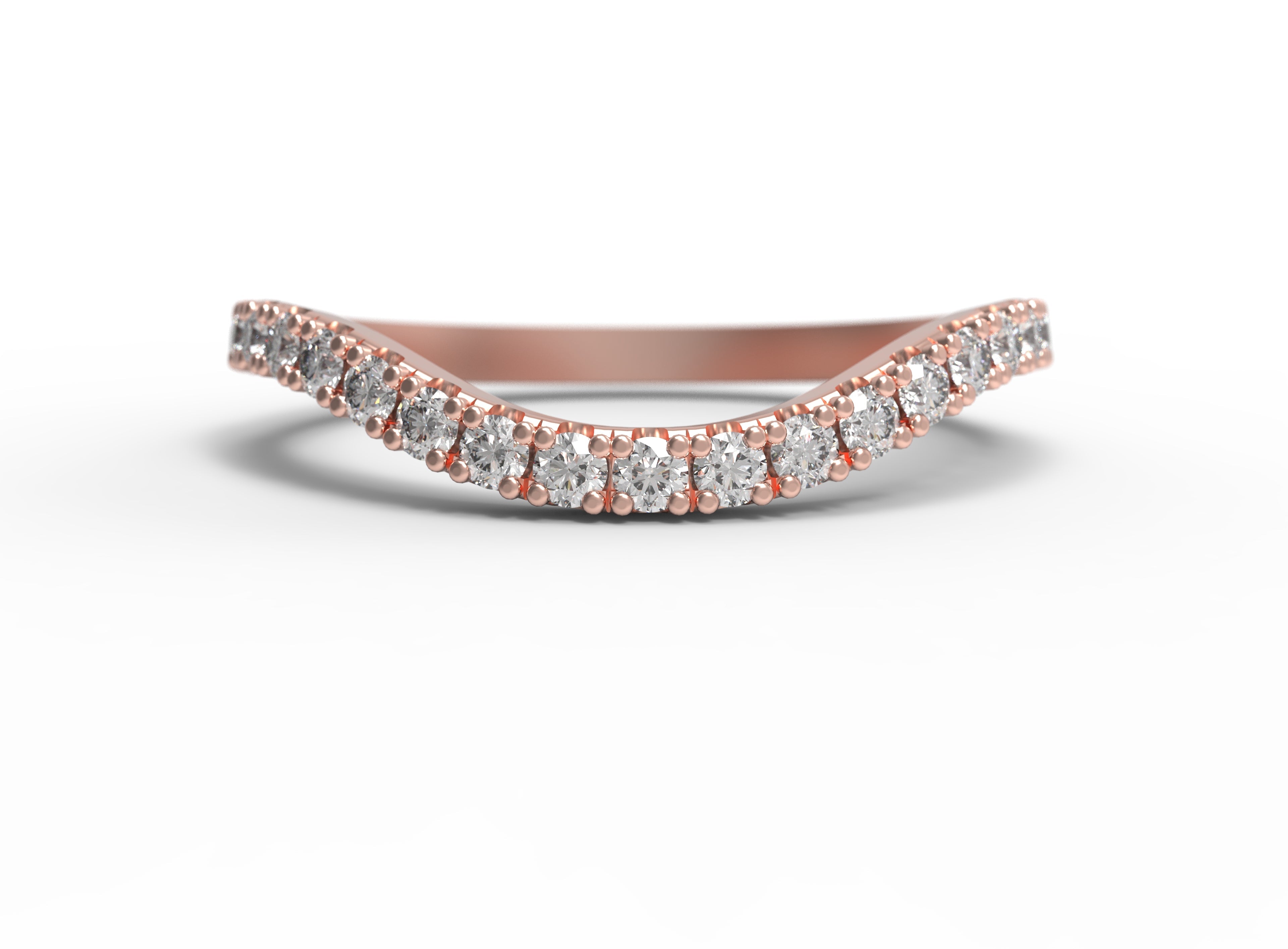 Close up of the curved Caia womens wedding band by Fluid Jewellery in rose gold