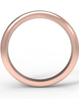 Close up of the curved flow womens wedding band by Fluid Jewellery in rose gold 3